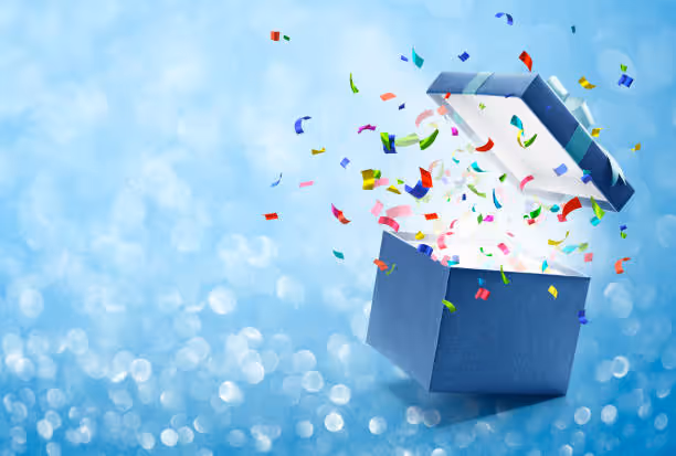 Confetti popping out from a gift box